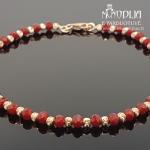 Auksinė apyrankė su karoliukais