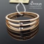 Auksinis žiedas su akmenukais