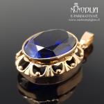 Dėvėtas auksinis pakabukas su mėlynu akmenuku