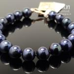 Auksinė apyrankė su juodais perlais