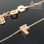 Auksinė grandinėlė su F raidelę