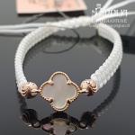 Auksinė apyrankė su baltu dobiliuku