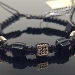 Auksinė apyrankė su karoliukais