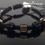 Auksinė apyrankė su karoliukais