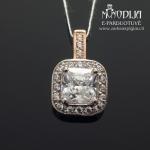 Auksinis pakabukas su baltais akmenukais