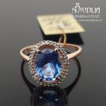 Auksinis žiedas su žydra akute