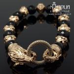 Auksinė apyrankė su oniksais