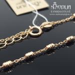 Auksinė grandinėlė ant kojos