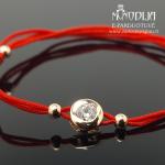 Auksinė apyrankė su balta akute