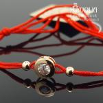 Auksinė apyrankė su balta akute