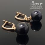 Kabantys auksiniai auskarai su juodais perlais