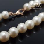 Auksinis perlų vėrinys