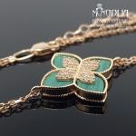 Auksinė apyrankė su akmenukais