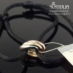 Juodo siūlo auksinė apyrankė