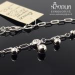 Sidabrinė grandinėlė ant kojos