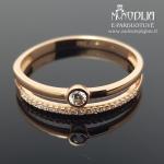 Dvigubas auksinis žiedas su akutėmis