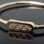 Auksinė apyrankė su akutėmis